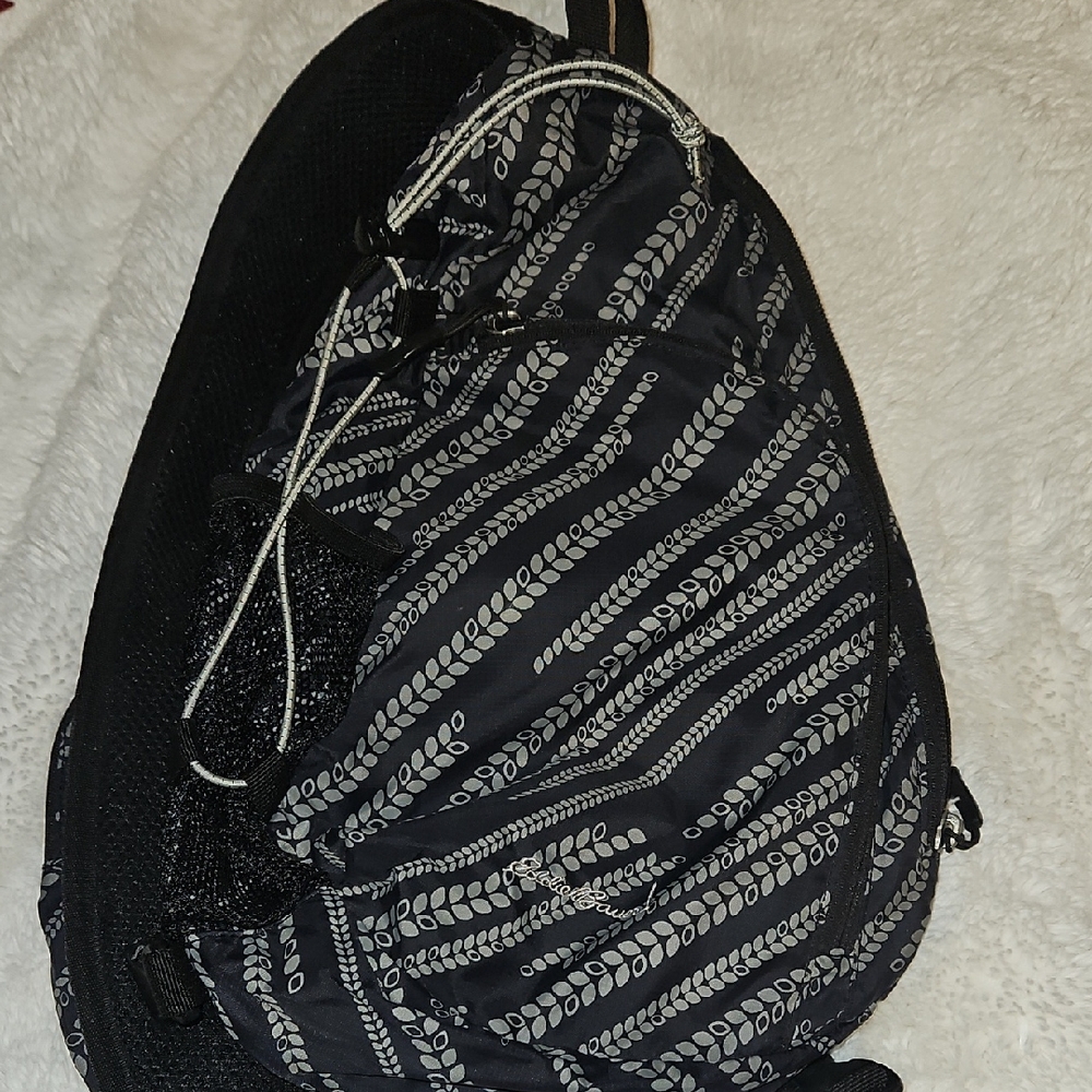Eddie Bauer Black Sling Backpack with Leaf-Stripe Pattern